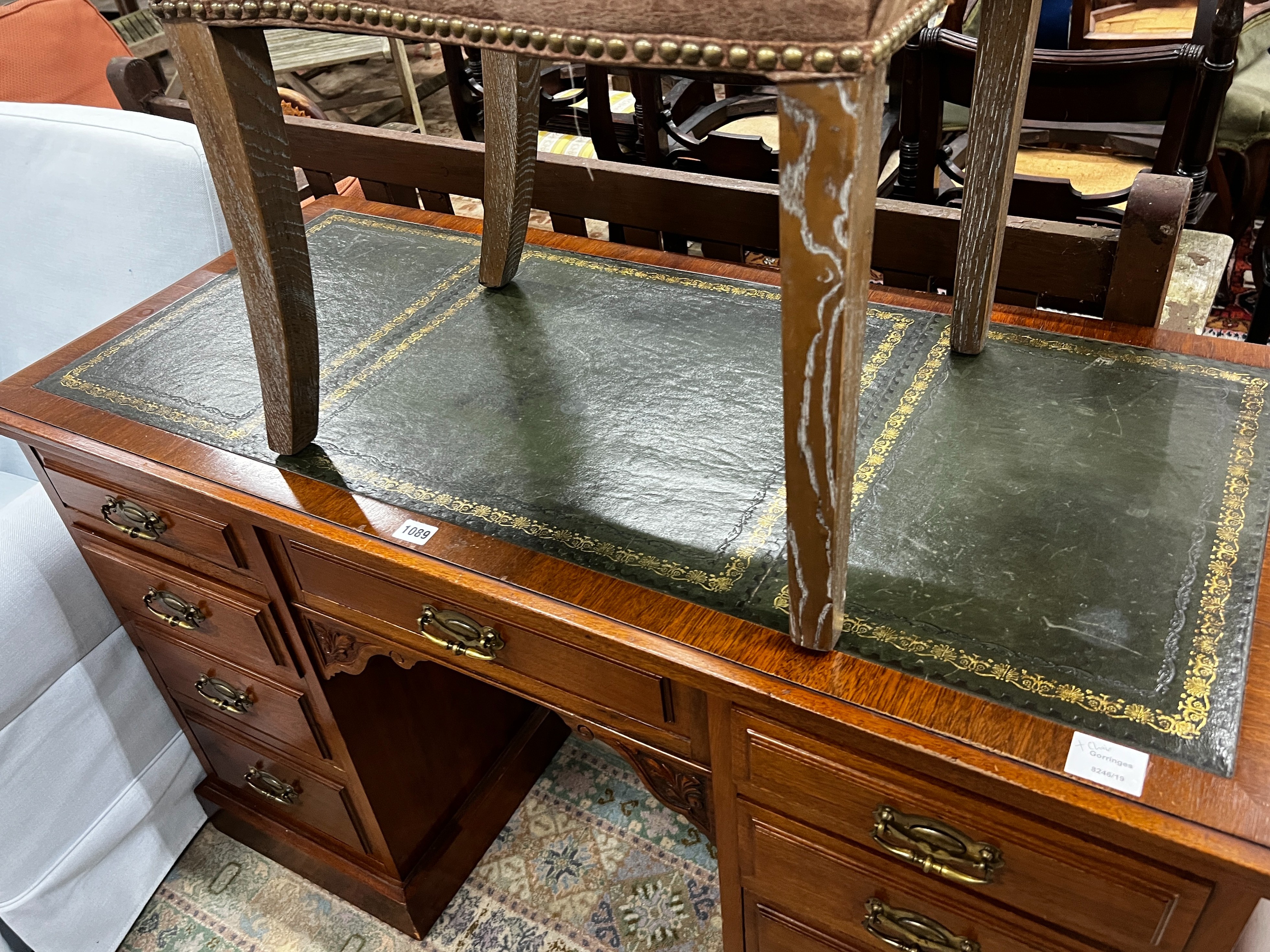 A late Victorian mahogany kneehole writing desk, width 122cm, depth 55cm, height 75cm together with an Oka limed oak chair